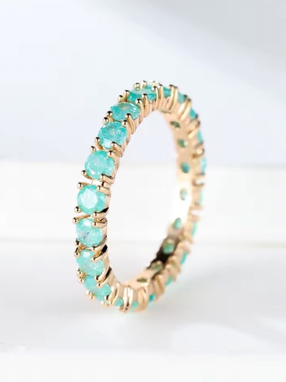 Gold Band Ring with Aquamarine Stones